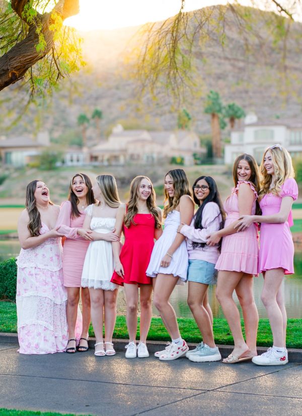 Woman seated in a lush natural setting