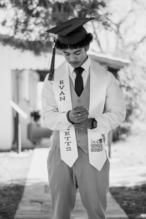 Graduate portrait with warm lighting