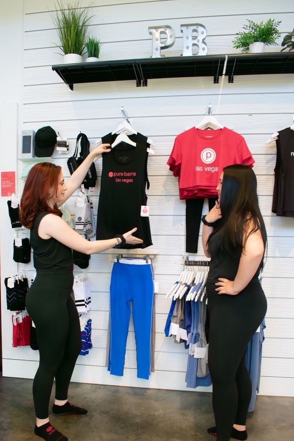 Dancer mid-movement at the barre