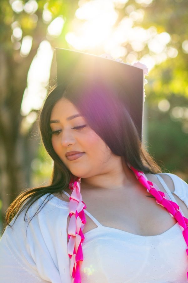 Senior portrait with graduation stole