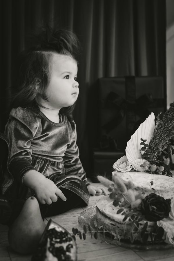 Baby enjoying a cake smash session