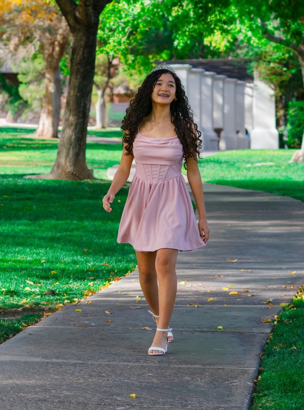 Young woman in a pink dress for her quinceañera